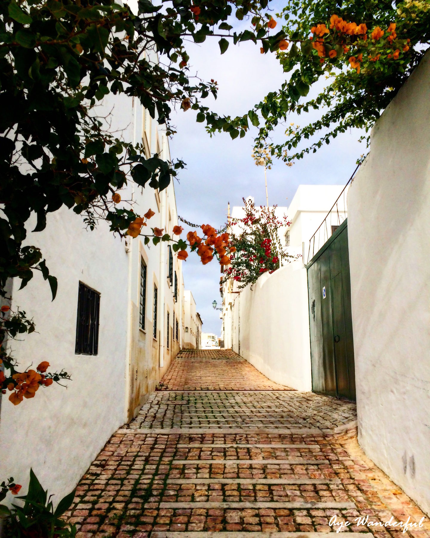 Our flat was at the far end of this pretty little street | Winter Break | Albufeira | Algarve | Portugal | Read more on www.ayewanderful.com