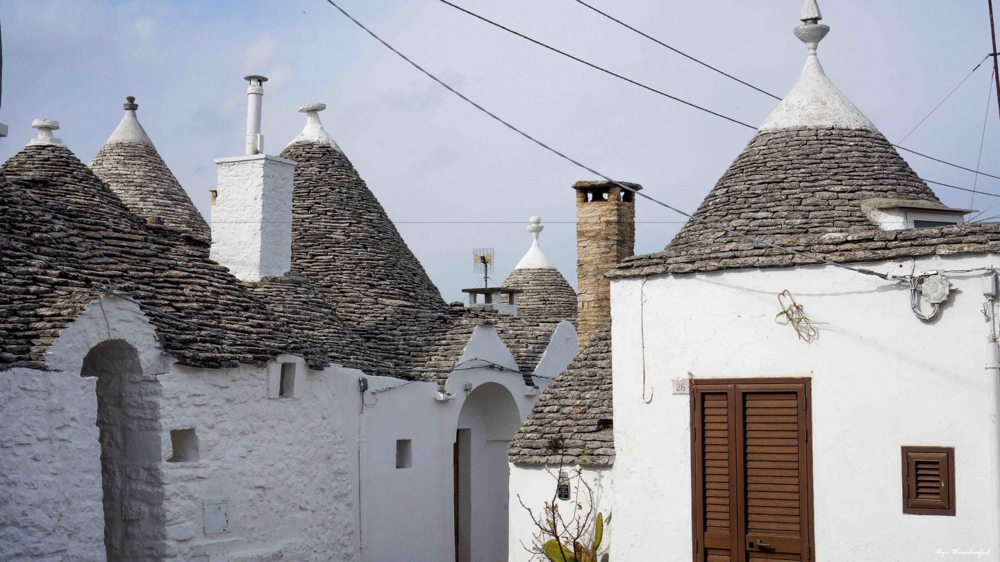 A travel guide for a quick getaway to Italy with everything you need to know about how to spend 2 days in Puglia in the charming towns of Ostuni and Alberobello.